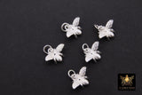 May include: Six sterling silver bee charms displayed against a black background. Each charm features intricate detailing, showcasing the bee's wings, body, and legs.  The charms are small and delicate, suitable for jewelry making.  A Girls Gems branding is visible in the bottom right corner. 925 Sterling Silver Bee Charms, 11 mm Bumble Bee Charms, Small Silver Honey Bee, Stamped 925